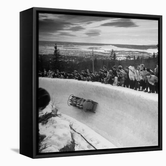 Bobsled Racing by on a Big Vendleboe Curve During the Winter Olympics-Nat Farbman-Framed Stretched Canvas