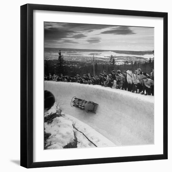 Bobsled Racing by on a Big Vendleboe Curve During the Winter Olympics-Nat Farbman-Framed Premium Photographic Print