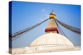 Bodhnath Stupa with Buddha Eyes and Prayer Flags, Clear Blue Sky, Kathmandu, Nepal. Stock Photo:-De Visu-Stretched Canvas