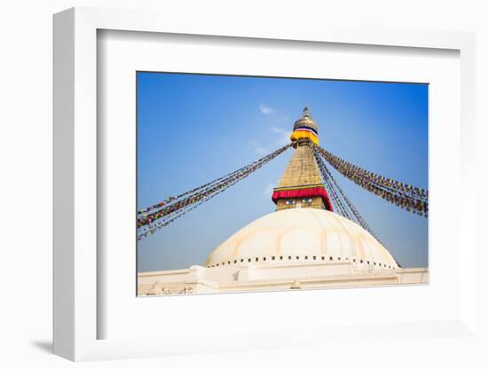 Bodhnath Stupa with Buddha Eyes and Prayer Flags, Clear Blue Sky, Kathmandu, Nepal. Stock Photo:-De Visu-Framed Photographic Print