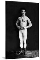 Bodybuilder in Leotard and Boots-null-Mounted Art Print