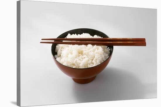 Boiled Basmati Rice in a Red Bowl with Chopsticks-Peter Rees-Stretched Canvas