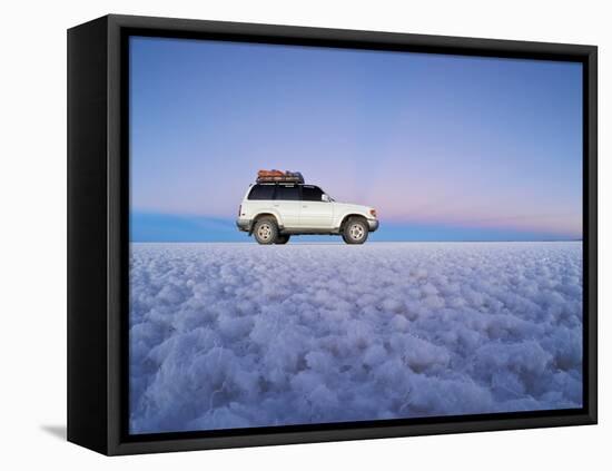 Bolivia, Potosi Department, Daniel Campos Province, White Toyota Landcruiser on the Salar de Uyuni,-Karol Kozlowski-Framed Stretched Canvas