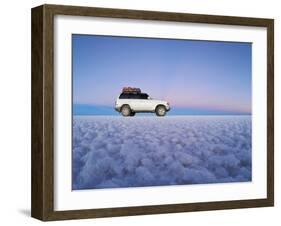 Bolivia, Potosi Department, Daniel Campos Province, White Toyota Landcruiser on the Salar de Uyuni,-Karol Kozlowski-Framed Photographic Print