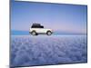 Bolivia, Potosi Department, Daniel Campos Province, White Toyota Landcruiser on the Salar de Uyuni,-Karol Kozlowski-Mounted Photographic Print