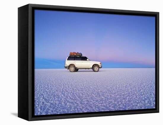 Bolivia, Potosi Department, Daniel Campos Province, White Toyota Landcruiser on the Salar de Uyuni,-Karol Kozlowski-Framed Stretched Canvas