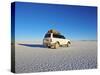 Bolivia, Potosi Department, Daniel Campos Province, White Toyota Landcruiser on the Salar de Uyuni,-Karol Kozlowski-Stretched Canvas