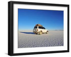 Bolivia, Potosi Department, Daniel Campos Province, White Toyota Landcruiser on the Salar de Uyuni,-Karol Kozlowski-Framed Photographic Print
