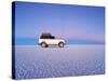 Bolivia, Potosi Department, Daniel Campos Province, White Toyota Landcruiser on the Salar de Uyuni,-Karol Kozlowski-Stretched Canvas