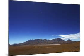 Bolivian desert, Bolivia. Arid landscape going toward lake and mountains.-Anthony Asael-Mounted Photographic Print