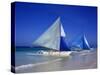 Boracay beach with traditional sailboats-Charles Bowman-Stretched Canvas