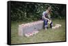 Bored Child Sitting with Raspberry Cartons-William P. Gottlieb-Framed Stretched Canvas