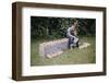 Bored Child Sitting with Raspberry Cartons-William P. Gottlieb-Framed Photographic Print