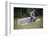 Bored Child Sitting with Raspberry Cartons-William P. Gottlieb-Framed Photographic Print