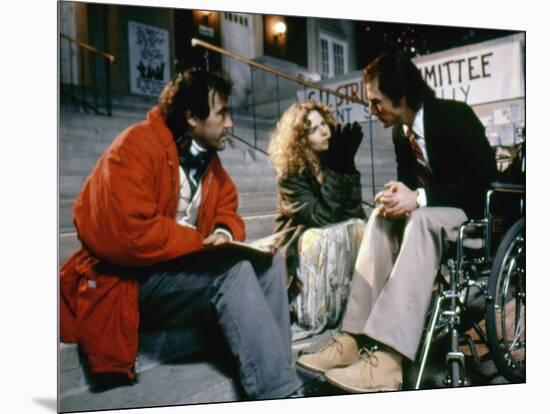 BORN ON THE FOURTH OF JULY, 1989 directed by OLIVER STONE On the set, Oliver Stone directs Kira Sed-null-Mounted Photo