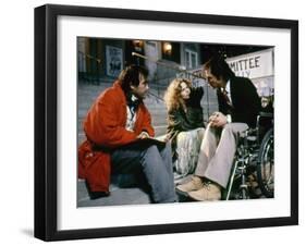 BORN ON THE FOURTH OF JULY, 1989 directed by OLIVER STONE On the set, Oliver Stone directs Kira Sed-null-Framed Photo