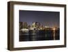 Boston Downtown with Urban City Skyline at Night with Skyscrapers Illuminated over Sea.-Songquan Deng-Framed Photographic Print