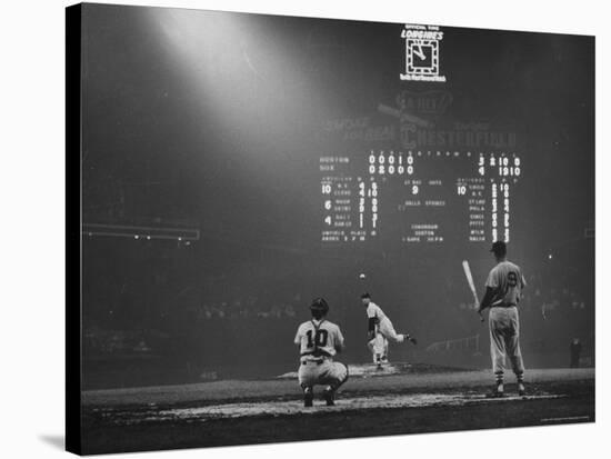 Boston Red Sox Player Ted Williams, While Watching Pitcher Warm-up. Catcher Sherm Lollar-Frank Scherschel-Stretched Canvas