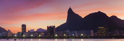 https://imgc.allpostersimages.com/img/posters/botafogo-bay-and-christ-the-redeemer-statue-at-sunset-rio-de-janeiro-brazil_u-L-PNYV8V0.jpg?artPerspective=n