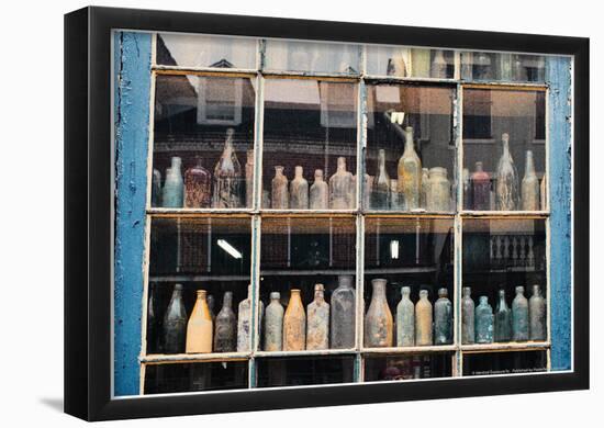 Bottles In New Orleans Louisiana Storefront-null-Framed Poster