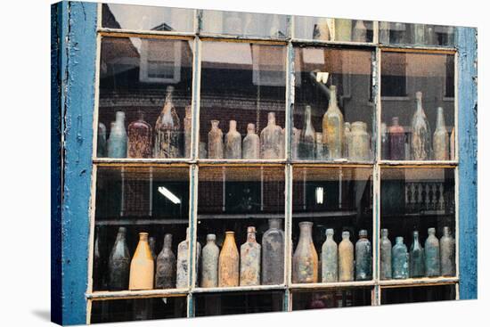 Bottles In New Orleans Louisiana Storefront-null-Stretched Canvas