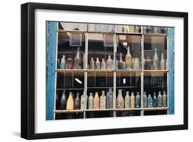 Bottles In New Orleans Louisiana Storefront-null-Framed Photo