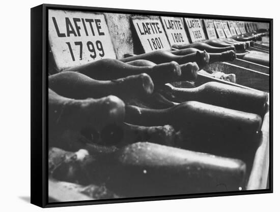 Bottles of Lafite Wines, Now Museum Pieces in French Wine Cellar-Carlo Bavagnoli-Framed Stretched Canvas