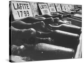 Bottles of Lafite Wines, Now Museum Pieces in French Wine Cellar-Carlo Bavagnoli-Stretched Canvas