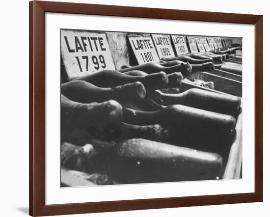 Bottles of Lafite Wines, Now Museum Pieces in French Wine Cellar-Carlo Bavagnoli-Framed Photographic Print