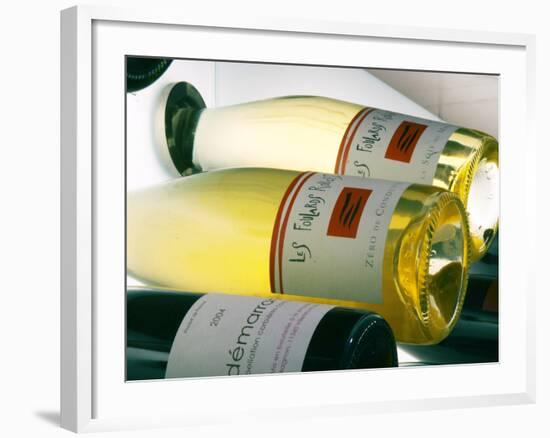 Bottles of Les Foulards Rouges, Lavinia Wine Shop, Paris, France-Per Karlsson-Framed Photographic Print