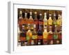 Bottles of Local Rum Drinks at Le Diamant Village, Martinique, West Indies, Caribbean-Guy Thouvenin-Framed Photographic Print