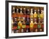 Bottles of Local Rum Drinks at Le Diamant Village, Martinique, West Indies, Caribbean-Guy Thouvenin-Framed Photographic Print