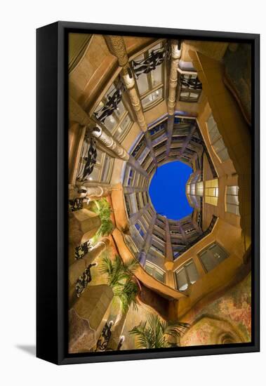 Bottom View of the Inner Courtyard of Casa Mila or La Pedrera at Dusk, Barcelona, Catalonia, Spain-Stefano Politi Markovina-Framed Stretched Canvas