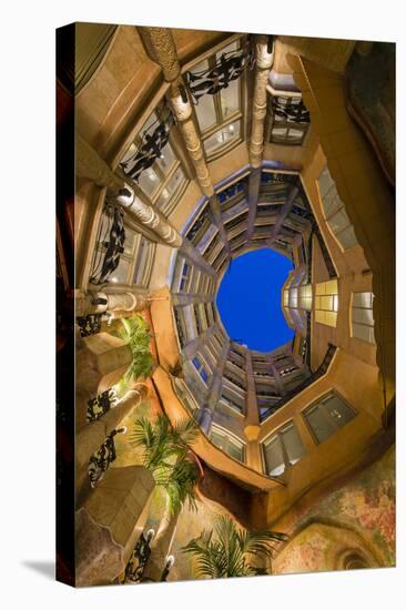 Bottom View of the Inner Courtyard of Casa Mila or La Pedrera at Dusk, Barcelona, Catalonia, Spain-Stefano Politi Markovina-Stretched Canvas