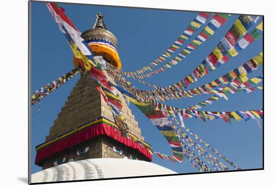 Bouddha (Boudhanath) (Bodnath) in Kathmandu is covered in colourful prayer flags, Kathmandu, Nepal-Alex Treadway-Mounted Photographic Print