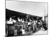 Bouquiniste Beside the River Seine in Paris, C.1900 (B/W Photo)-French Photographer-Mounted Giclee Print