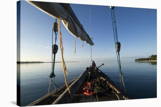Bow of a Traditional Dhow with Sail in Mafia Island Coast of Tanzania-Paul Joynson Hicks-Stretched Canvas