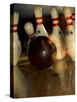 Bowling Ball Striking Pins-null-Stretched Canvas
