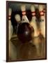 Bowling Ball Striking Pins-null-Framed Photographic Print