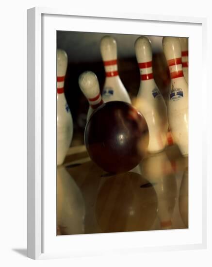 Bowling Ball Striking Pins-null-Framed Photographic Print