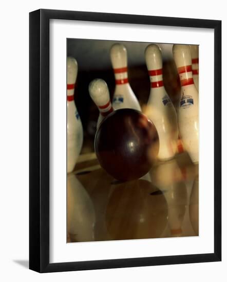 Bowling Ball Striking Pins-null-Framed Photographic Print