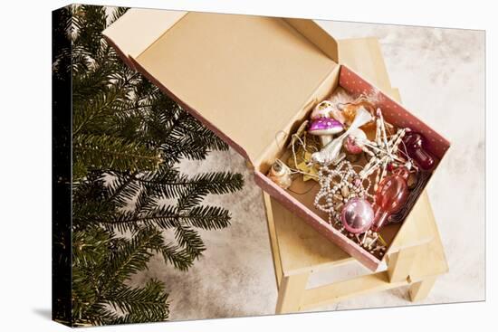 Box with Chistmas Ornaments Next to Christmas Tree, Munich, Bavaria, Germany-Dario Secen-Stretched Canvas