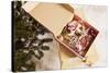 Box with Chistmas Ornaments Next to Christmas Tree, Munich, Bavaria, Germany-Dario Secen-Stretched Canvas