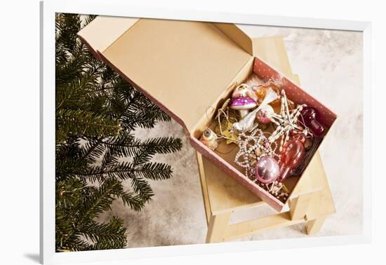 Box with Chistmas Ornaments Next to Christmas Tree, Munich, Bavaria, Germany-Dario Secen-Framed Photographic Print