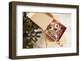 Box with Chistmas Ornaments Next to Christmas Tree, Munich, Bavaria, Germany-Dario Secen-Framed Photographic Print