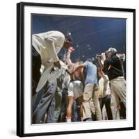 Boxer Cassius Clay, aka Muhammad Ali, Raising Fist in Triumph After Beating Sonny Liston-John Dominis-Framed Premium Photographic Print