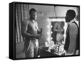 Boxer Joe Frazier Dressing During Training for a Fight Against Muhammad Ali-John Shearer-Framed Stretched Canvas