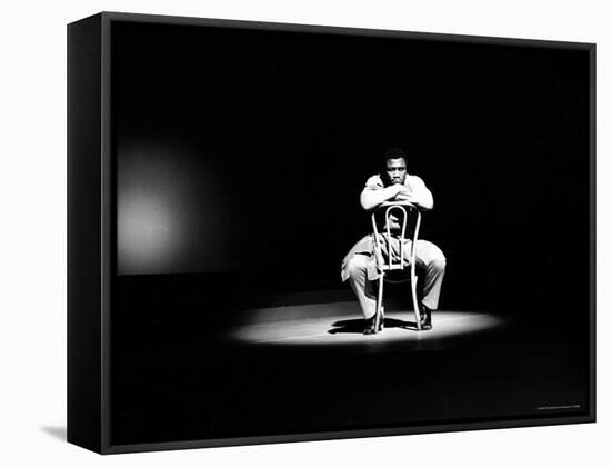 Boxer Joe Frazier Sitting on a Chair under a Spotlight-John Shearer-Framed Stretched Canvas