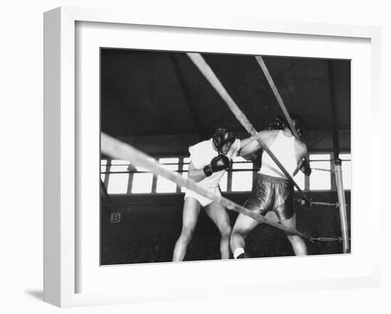 Boxer Joe Louis Fighting in Boxing Match-null-Framed Photographic Print