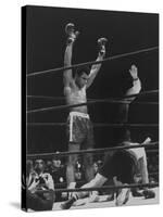 Boxer Muhammad Ali Raising His Gloves Victoriously After Knocking Out Oscar Bonavena-Bill Ray-Stretched Canvas